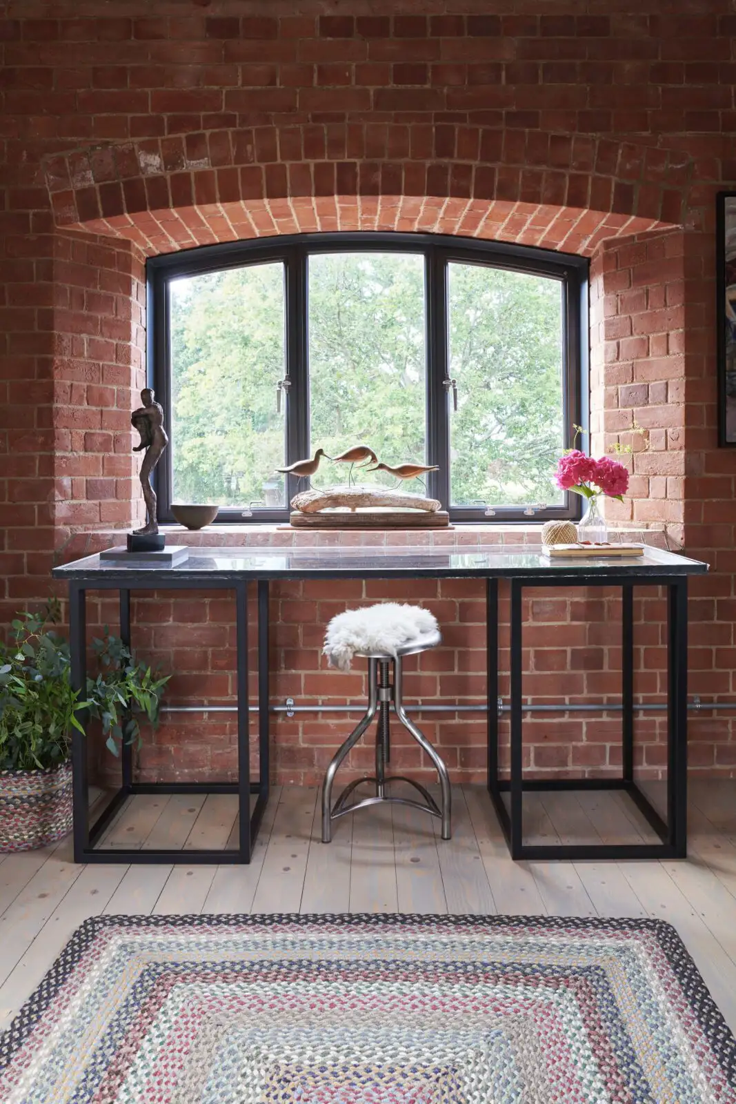 Exposed victorian-era brickwork interior of the contemporary and listed home